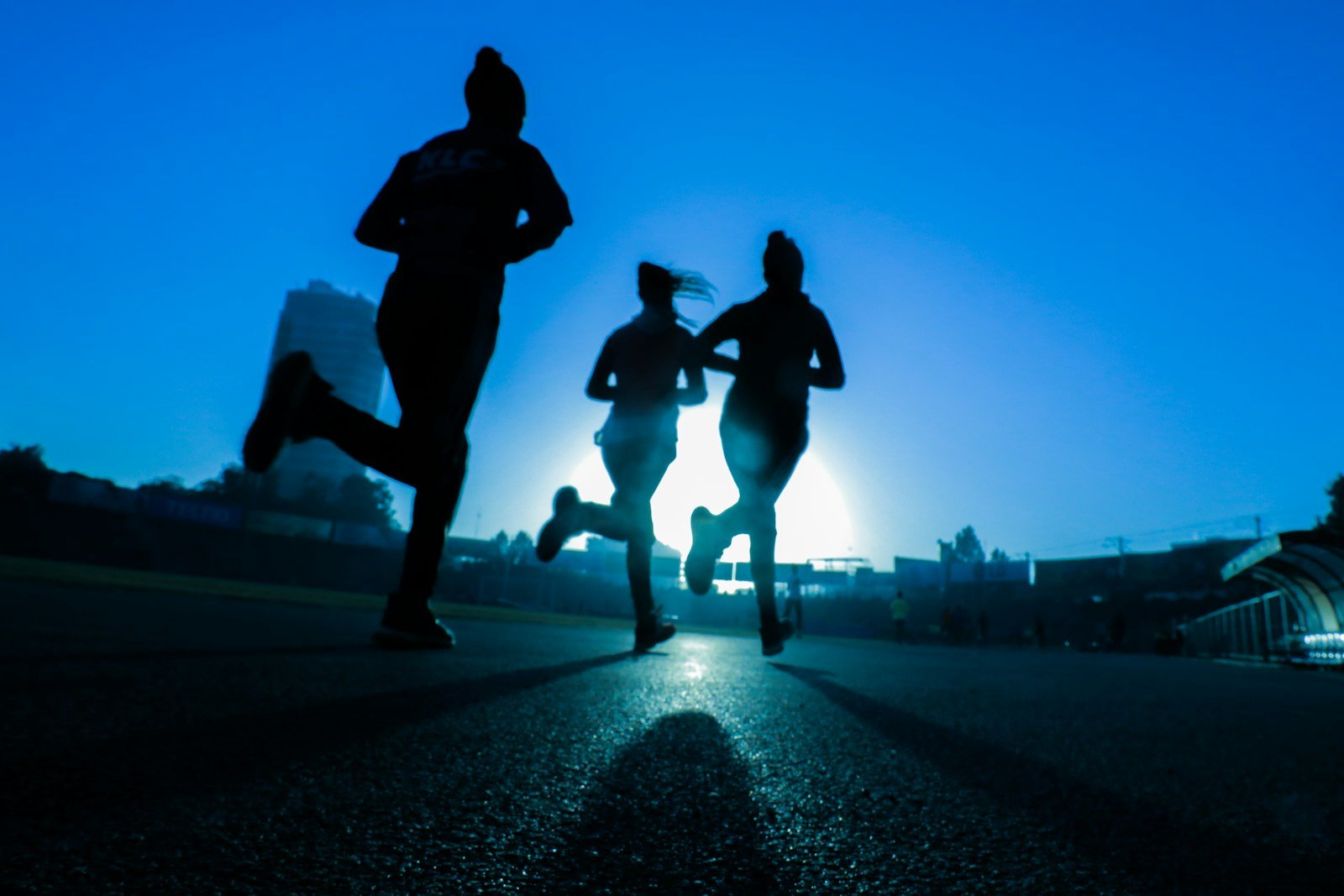 Runners in motion outdoors