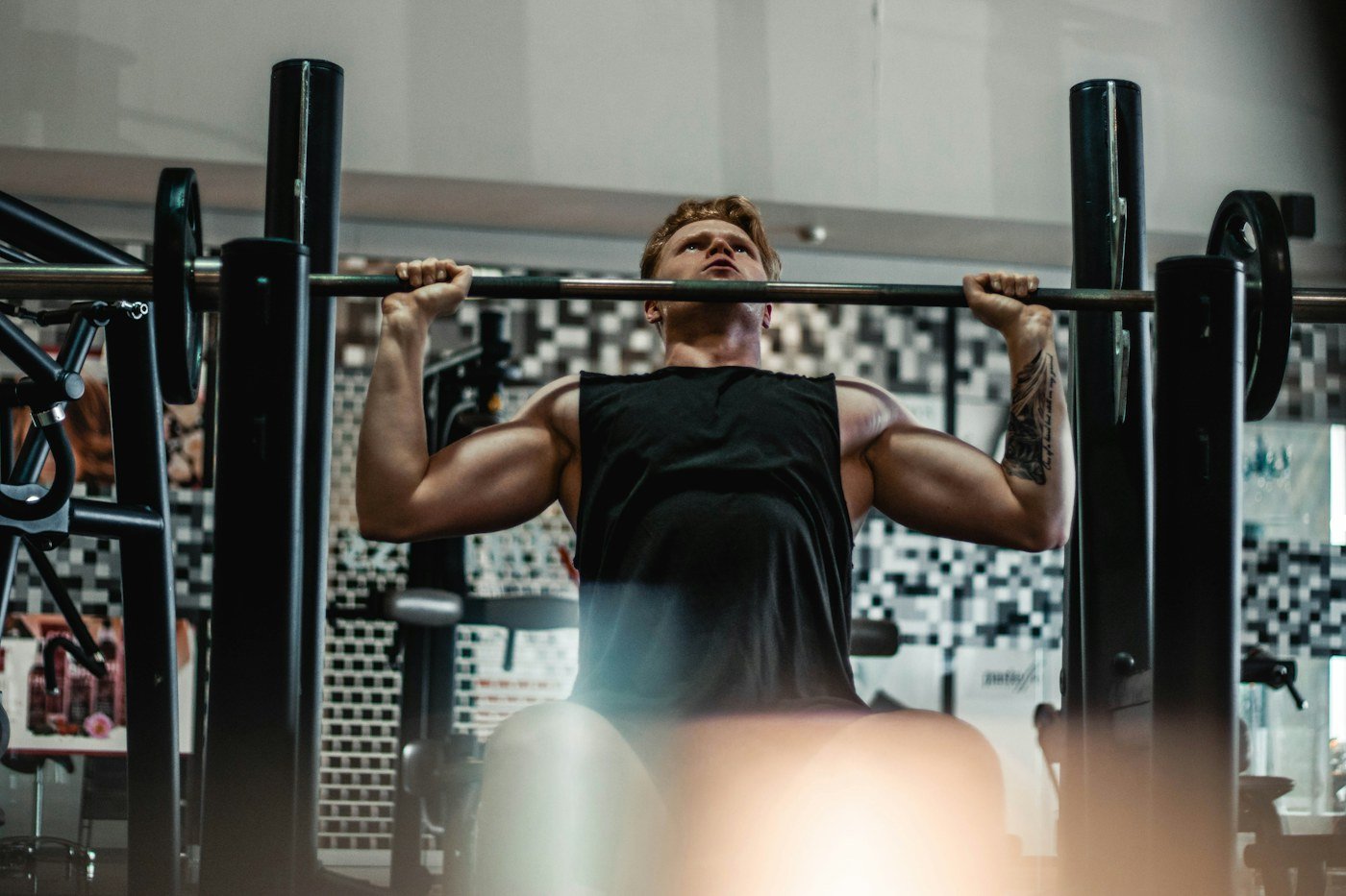 Athlete weightlifting in a fitness club